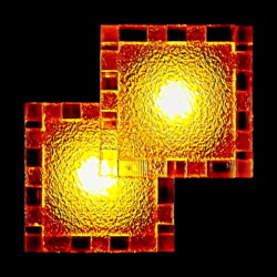 A 2D view of a frosted lucite Relativity box with LED tealights inside.