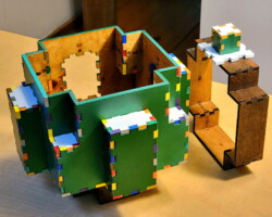 43 of 46 piece bottom part of a Christmas Tree Box, plus the 12-piece lip and the top 6 of the 66-piece top part of a Christmas Tree Box