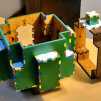 43 of 46 piece bottom part of a Christmas Tree Box, plus the 12-piece lip and the top 6 of the 66-piece top part of a Christmas Tree Box