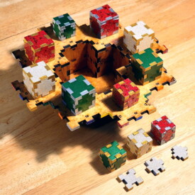 Little presents around the bottom of a Christmas Tree Box.