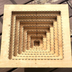 The inside of a 36-sided “Pyrabox.” The pieces are individually numbered with labels serving as assembly instructions.